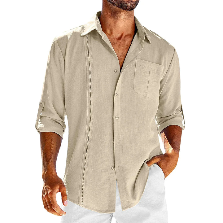 Men's beige casual linen shirt with button front, chest pocket, and rolled-up sleeves