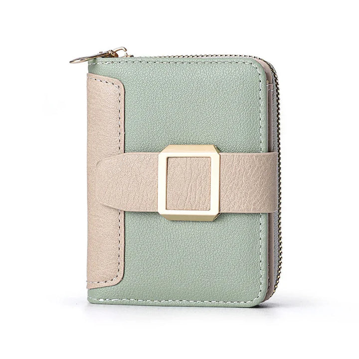 Compact green and beige leather wallet with gold buckle and zipper closure