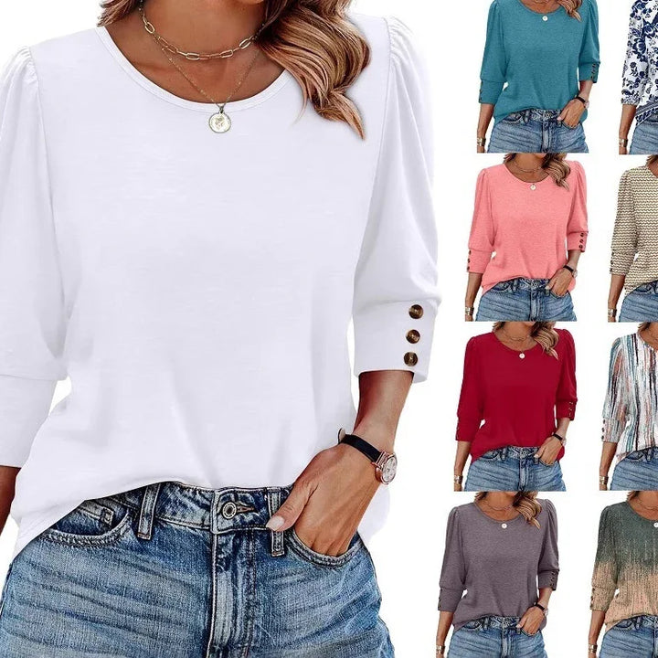 Woman wearing casual white long-sleeve buttoned cuff top paired with denim jeans, shown with 8 color variations