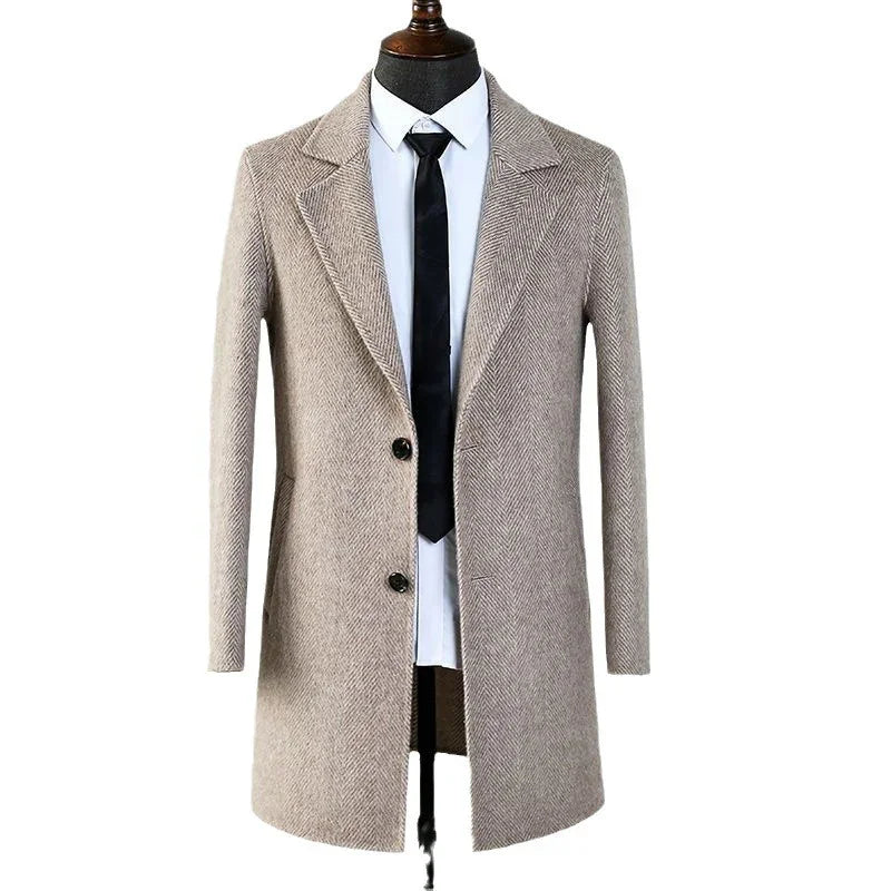 Beige herringbone wool coat on mannequin with white shirt and black tie