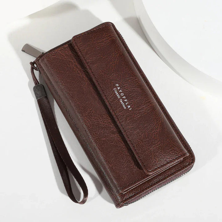 Brown leather wristlet wallet with zipper and strap, embossed with PAXOFFLA Classic fashion