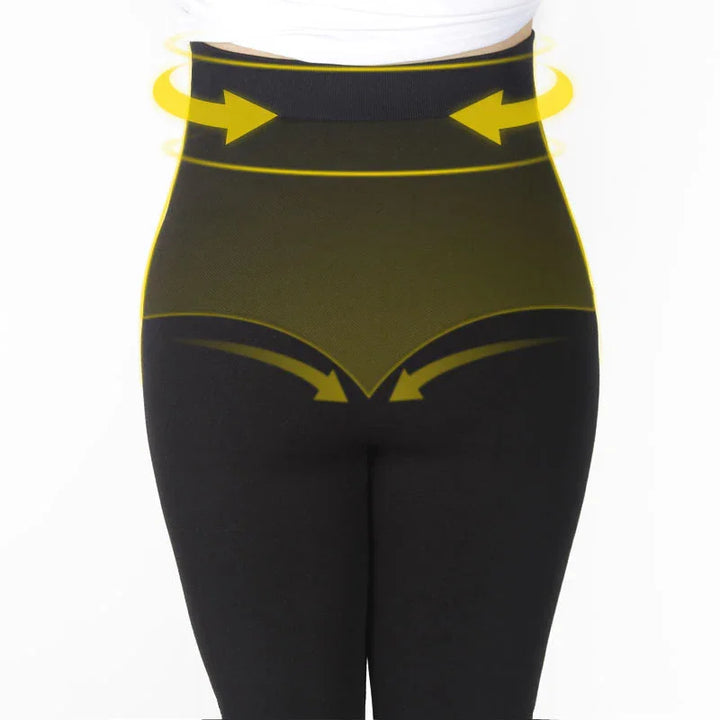 Black high-waisted shaping leggings with yellow arrows highlighting waist and hip contour compression