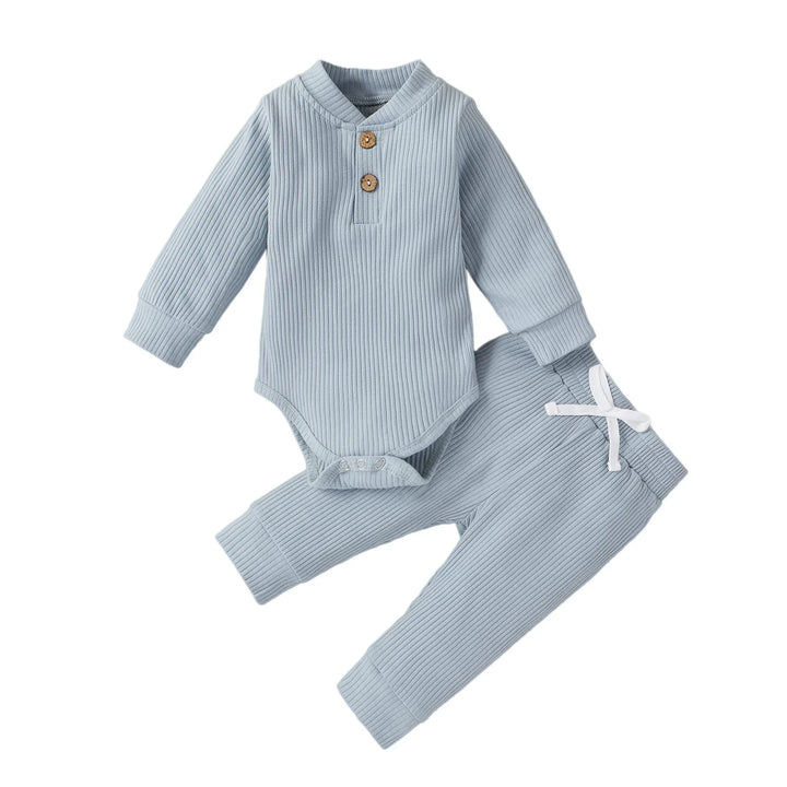 Light blue ribbed baby bodysuit with wooden buttons and matching pants with white drawstring