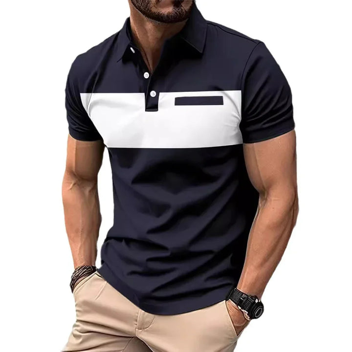 Muscular man wearing navy blue polo shirt with white chest stripe and beige pants