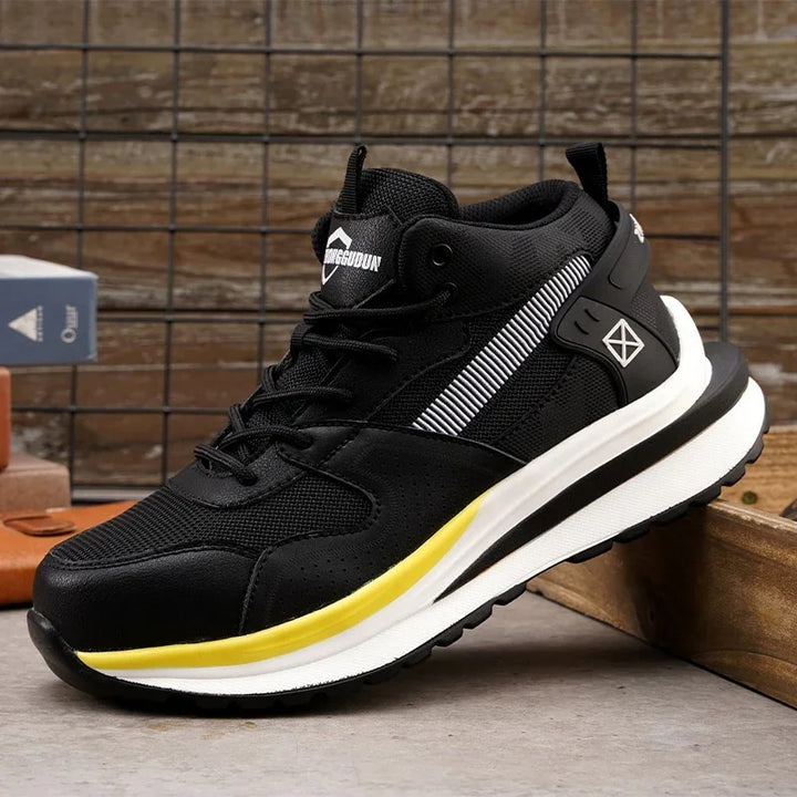 Black high-top athletic sneaker with white sole and yellow accent, mesh and synthetic upper