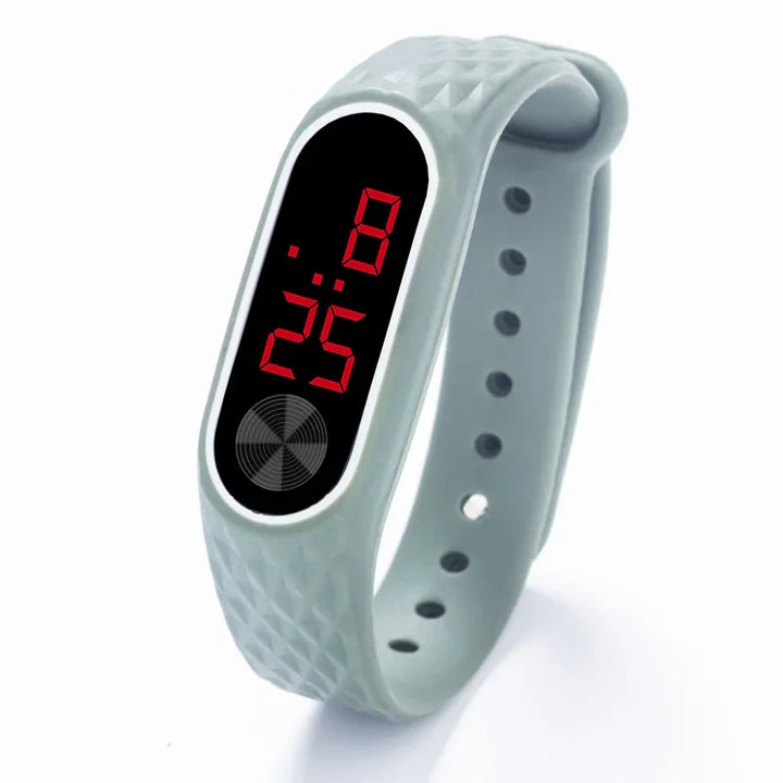 Gray silicone digital wristband with red LED time display and textured band design