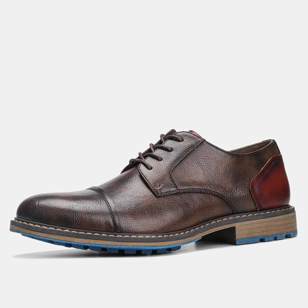 Brown leather men's dress shoe with cap toe, lace-up closure, and blue rubber sole