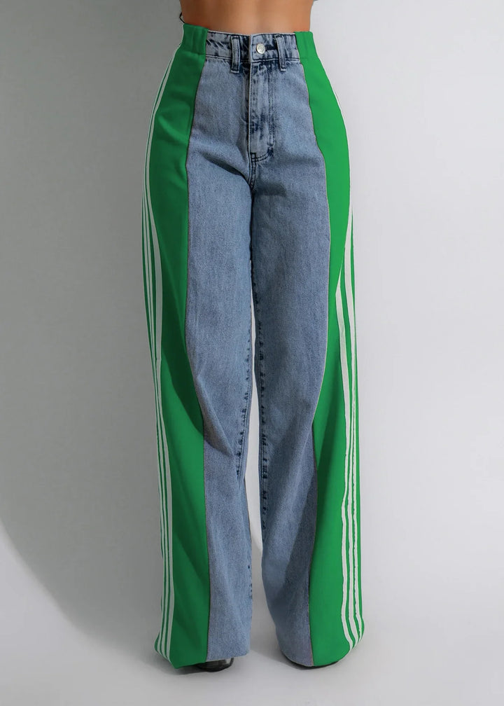 High-waisted jeans with green sporty side panels and white stripes, wide-leg fit