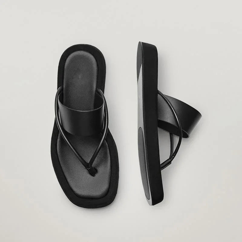 black womens sandals with square toe and double strap on gray background
