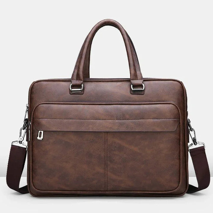 brown leather briefcase bag with handles and detachable shoulder strap on white background