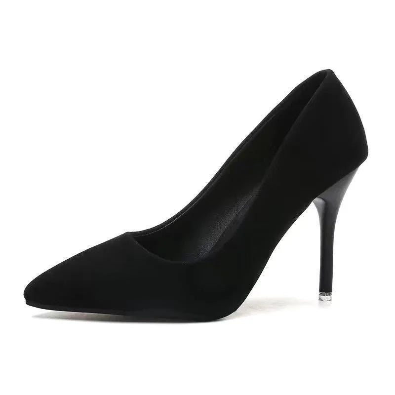 black pointed toe stiletto high heel pump on white background