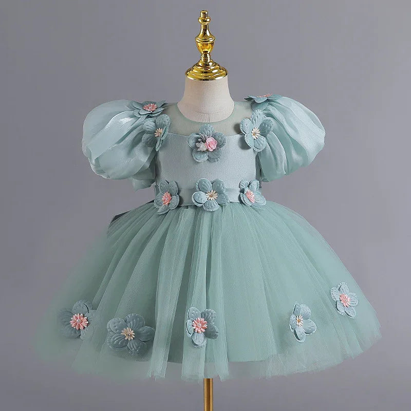 Light blue toddler dress with puff sleeves and 3D flower appliques on skirt and bodice