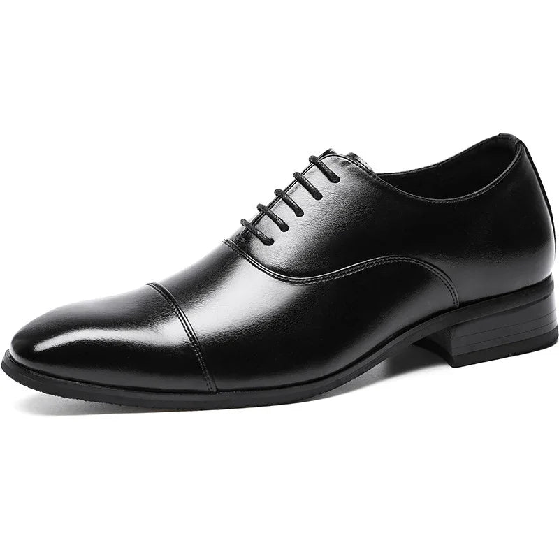Black leather men's dress shoe with cap toe and lace-up detailing on white background
