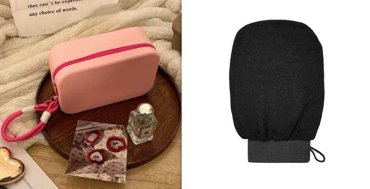 Pink zippered travel pouch on wooden tray with perfume bottle and rose petal pack; black exfoliating glove