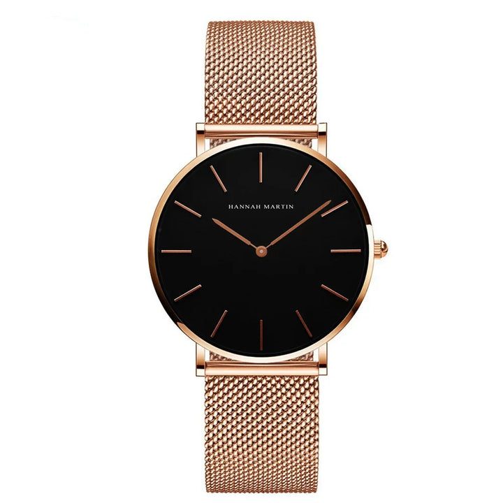 Hannah Martin rose gold mesh band wristwatch with black minimalist dial and rose gold markers
