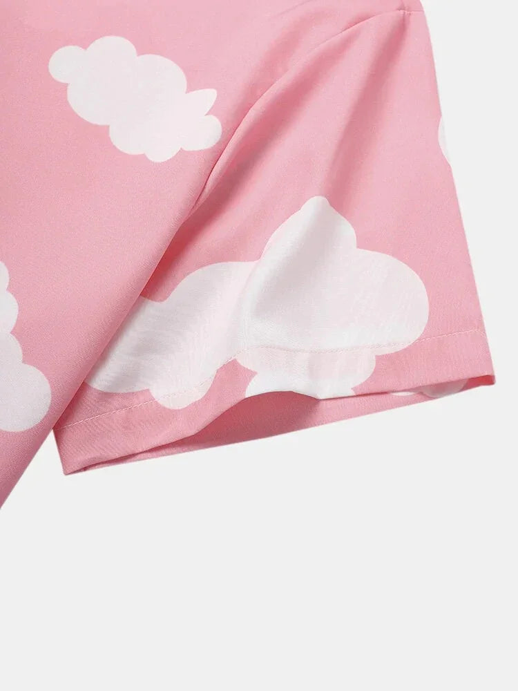 Close-up of pink fabric with white cloud pattern on short sleeve cotton t-shirt