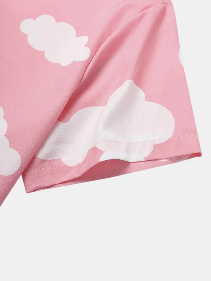 Close-up of pink fabric with white cloud pattern on short sleeve cotton t-shirt