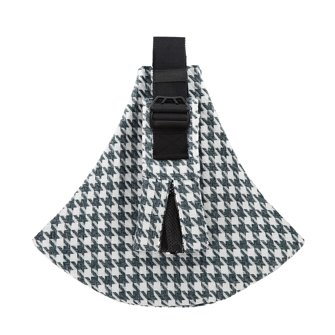 Black and white houndstooth pattern fabric bag with black adjustable strap and buckle