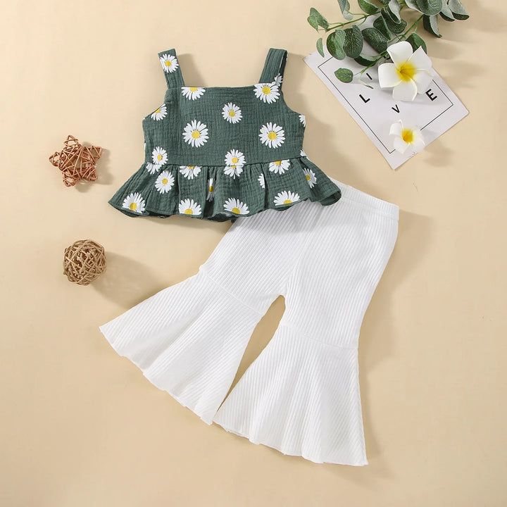 Green daisy print sleeveless peplum top with white ribbed bell-bottom pants for kids