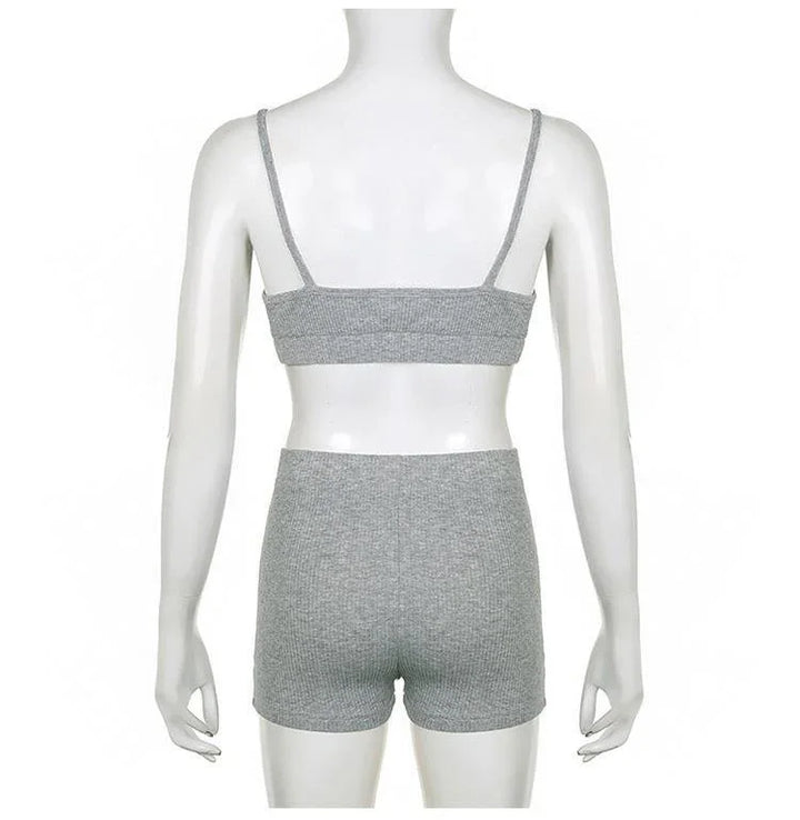 Back view of mannequin wearing gray knit tank top and matching high-waisted shorts set