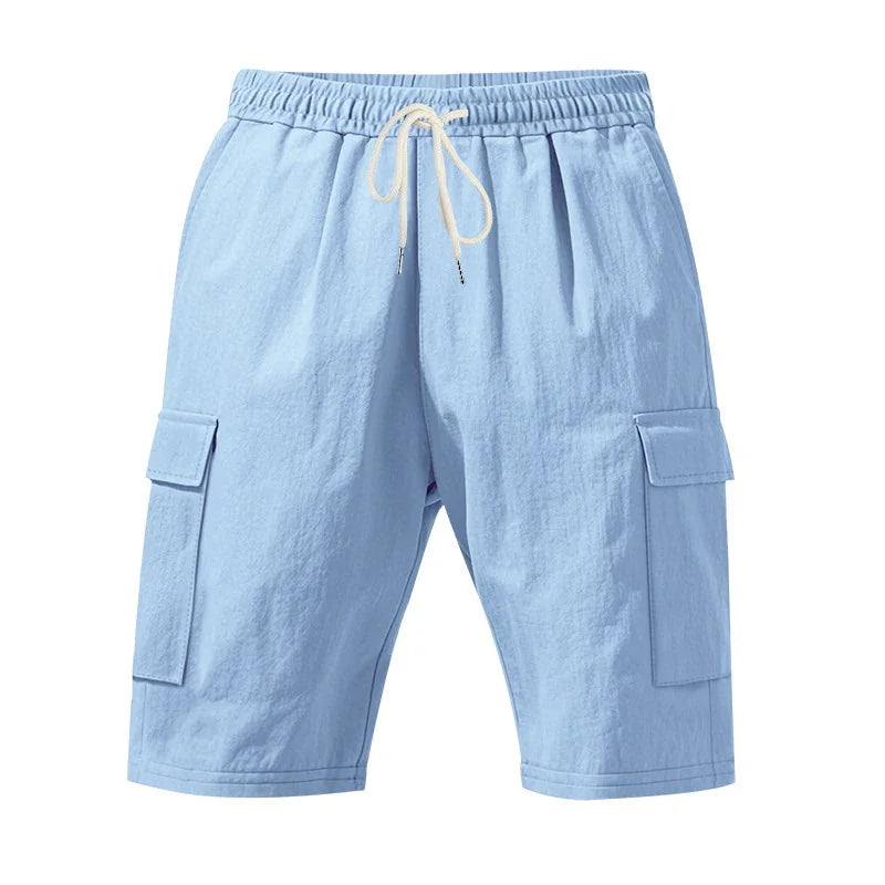 Light blue men's cargo shorts with elastic waistband and white drawstring on white background