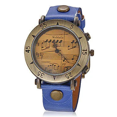 Vintage style wristwatch with blue leather strap and music sheet dial featuring WoMaGe brand