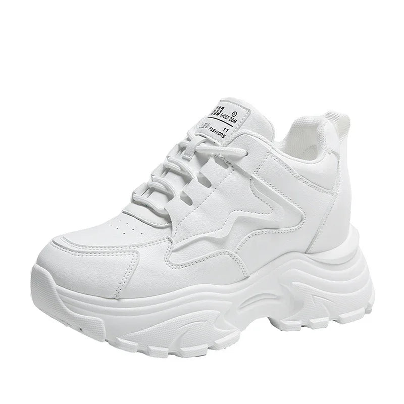 white chunky platform sneaker with textured sole and lace-up design