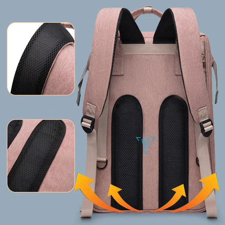 Pink ergonomic backpack with breathable black mesh padding and adjustable straps for comfort and ventilation
