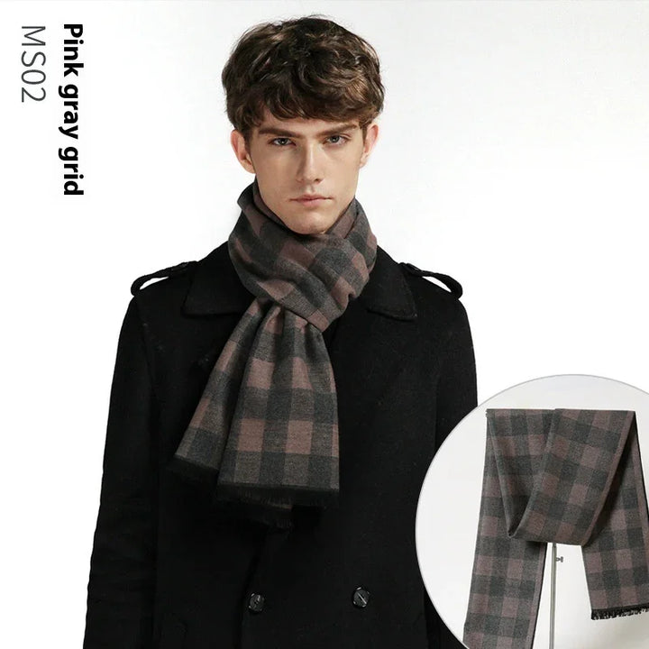 Young man wearing pink and gray checkered scarf with black coat, stylish winter fashion accessory