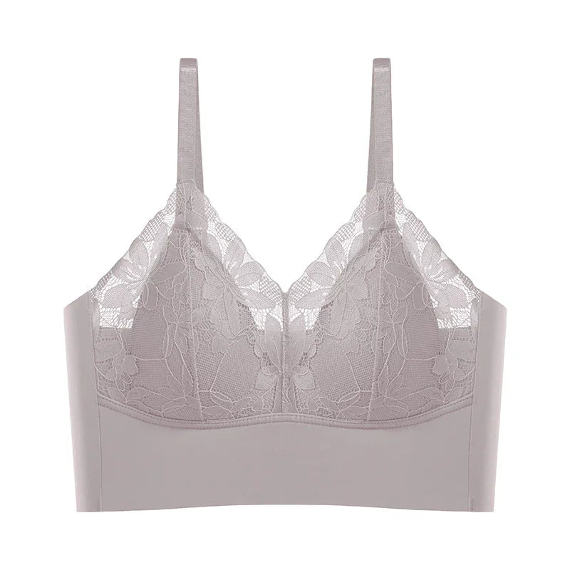 light gray lace bralette with floral pattern and adjustable straps on white background