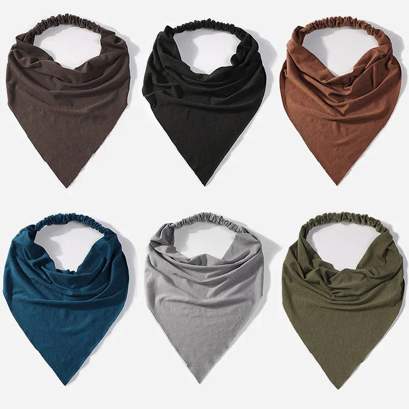 Six triangular bandana headbands in brown, black, rust, teal, gray, and olive green arranged on white background