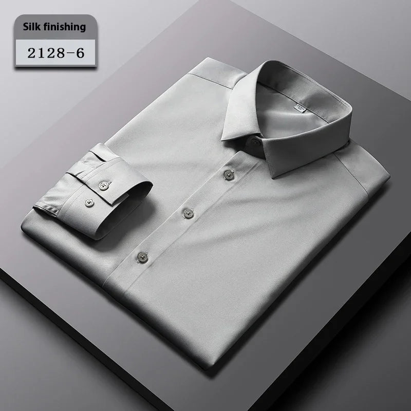 Silk finish light gray men's dress shirt folded on gray surface with tag 2128-6