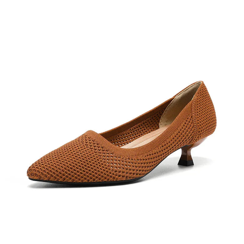 Brown woven pointed-toe kitten heel shoe with a low slender heel on white background