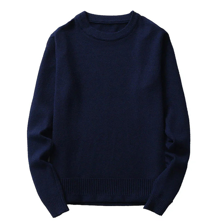 Classic navy blue crewneck sweater with ribbed cuffs and hem, cozy knitwear