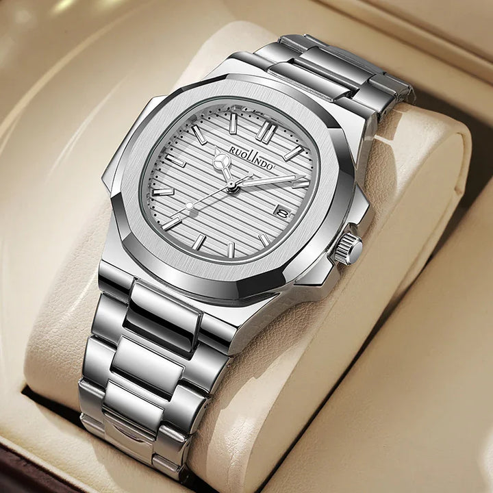 Silver RUOLINDO stainless steel wristwatch with striped dial and date display on beige cushion