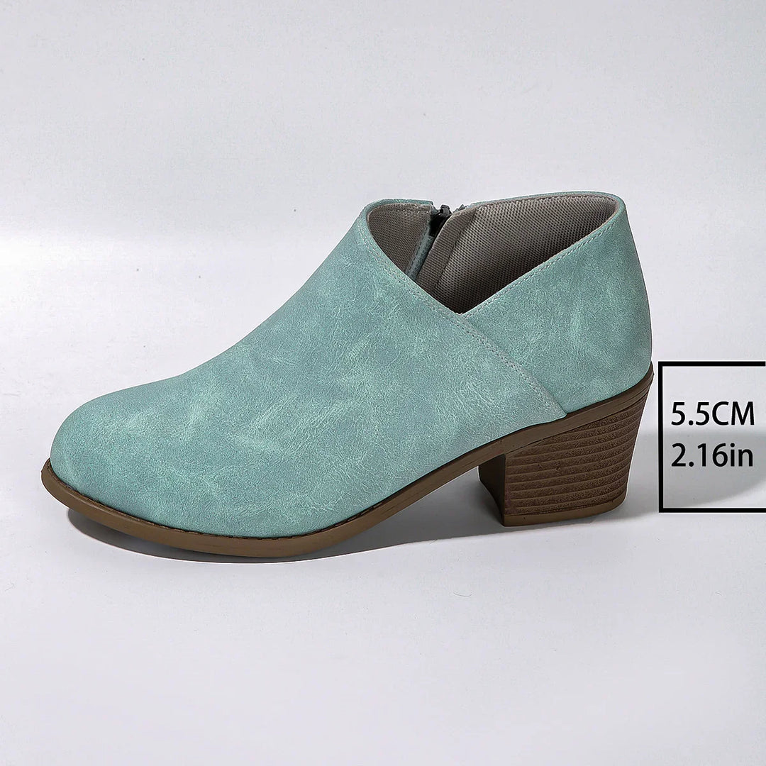Light blue suede ankle boot with 5.5cm chunky brown heel and side zipper
