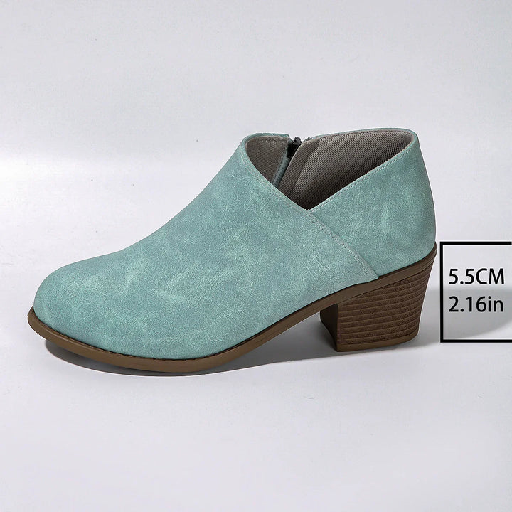 Light blue suede ankle boot with 5.5cm chunky brown heel and side zipper
