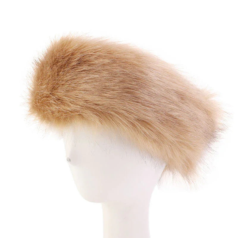 Light brown furry winter hat displayed on white mannequin head against white background