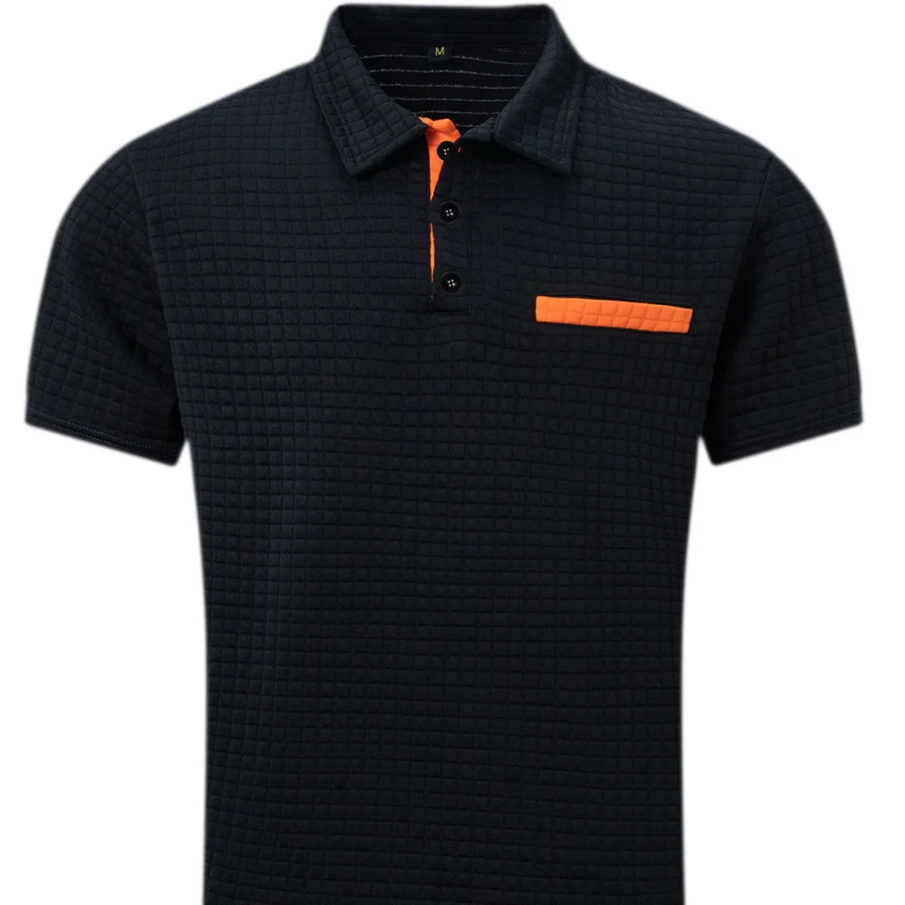 Black textured polo shirt with orange inner placket and pocket detail, short sleeves, medium size