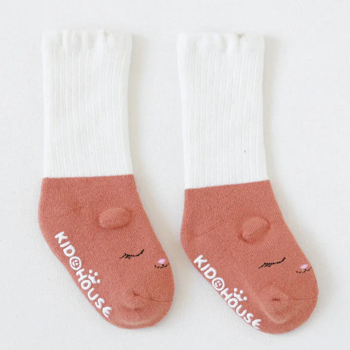 Pair of kids' white and brown socks with animal face design and Kidhouse logo