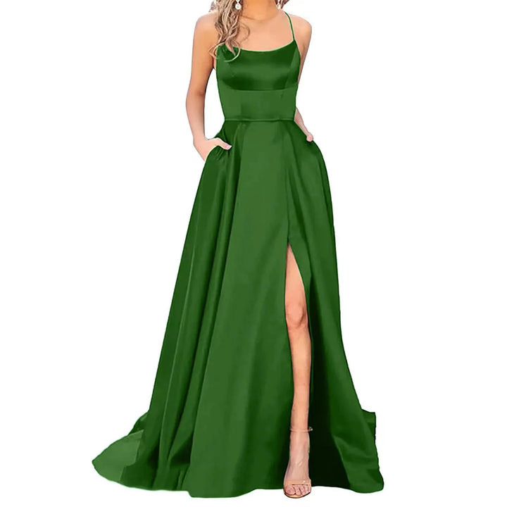 Elegant dark green satin evening gown with spaghetti straps, pockets, and thigh-high slit