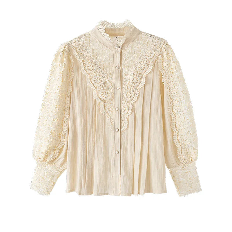 Vintage cream lace blouse with floral embroidery, long puff sleeves, and button-up front