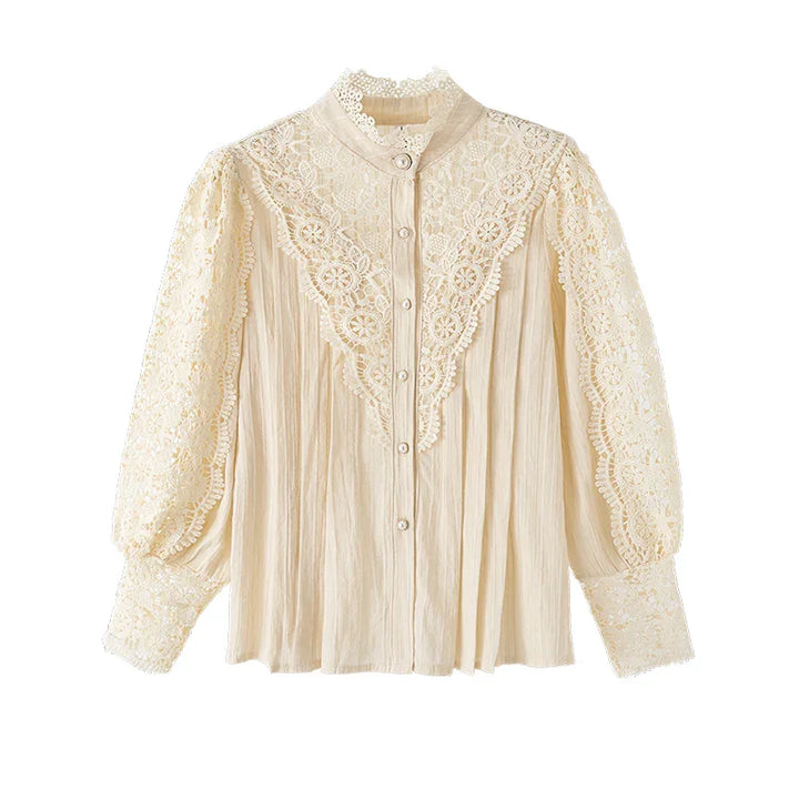 Vintage cream lace blouse with floral embroidery, long puff sleeves, and button-up front