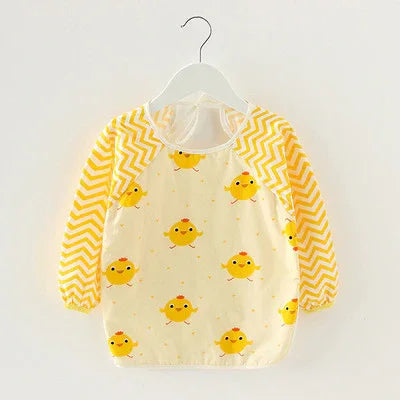 Baby bib with yellow chick pattern and yellow chevron sleeves, hanging on white hanger