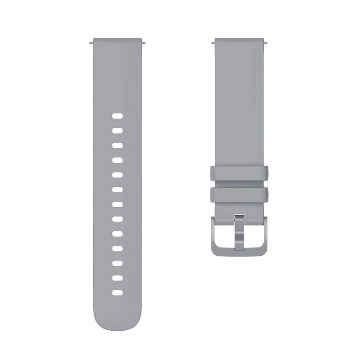 Light gray silicone watch strap with multiple adjustment holes and a metal buckle