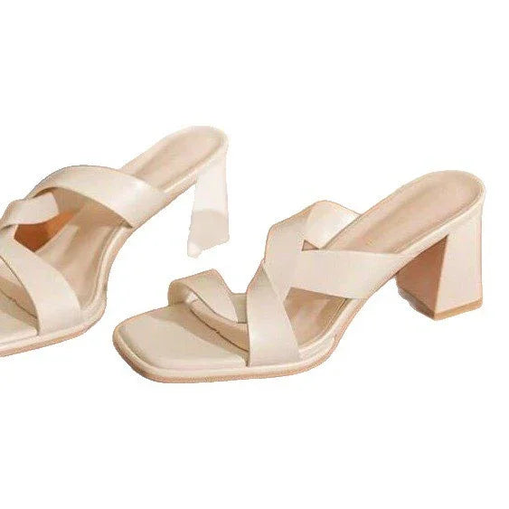 Beige open-toe block heel sandals with crossed straps and square toe design