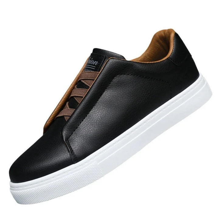 Black leather sneaker with brown laces and interior, white rubber sole, casual shoe