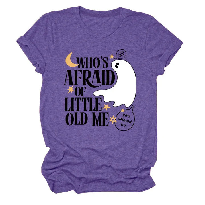Purple t-shirt with Halloween ghost graphic and text 'Who's afraid of little old me' with moon and stars
