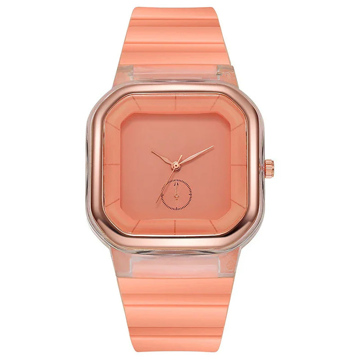 Modern square rose gold watch with peach silicone strap and minimalist dial