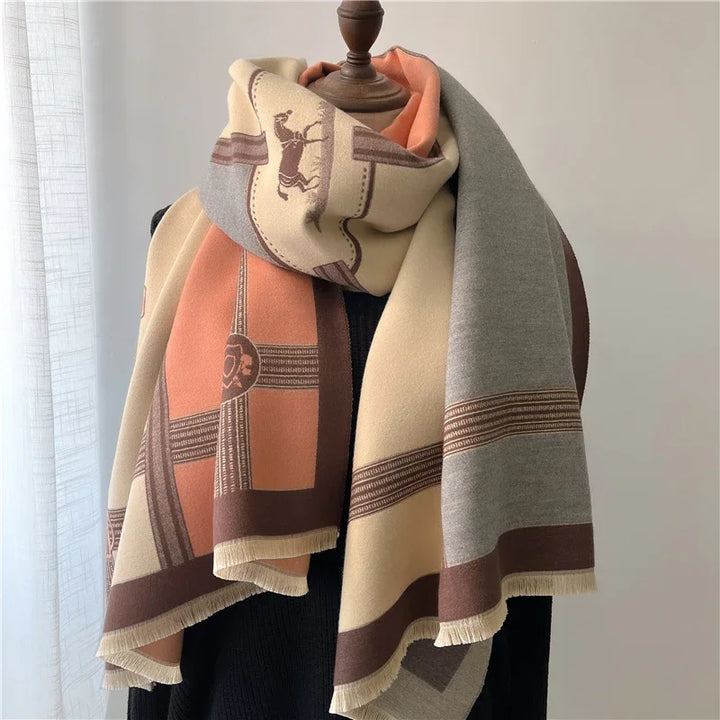 Elegant multicolor winter scarf with horse print and geometric patterns on mannequin